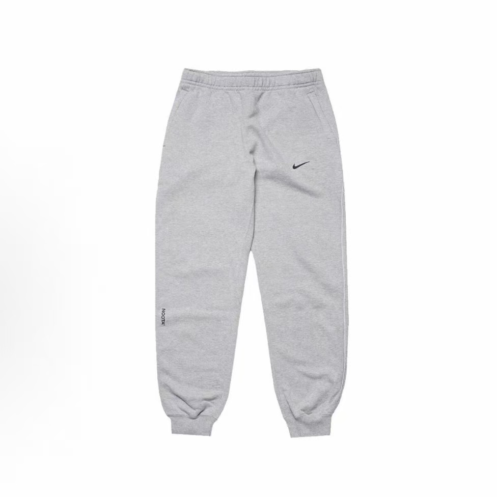 나이키 x 녹타(NOCTA) SS24 플리스 로고 미드라이즈 조거 니트 트레이닝 팬츠 그레이